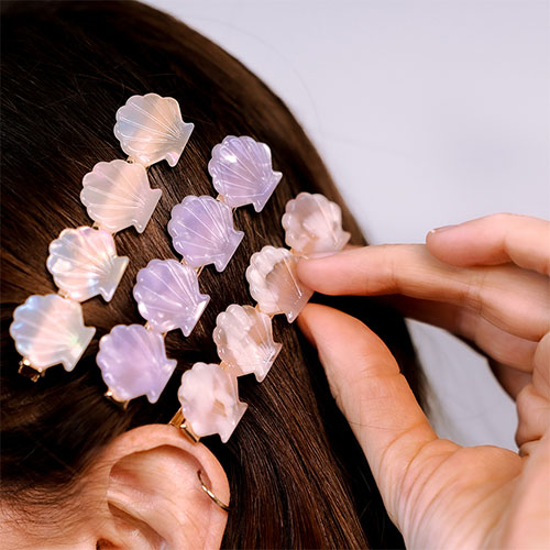 Cr&eacute;ez des looks d'&eacute;t&eacute; uniques avec nos barrettes et pinces &agrave; cheveux