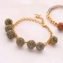 Bracelets festifs avec des nouveaux pompons scintillants