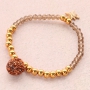 Bracelets festifs avec des nouveaux pompons scintillants