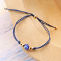 Confectionner de magnifiques bracelets avec les nouvelles perles &OElig;il porte-bonheur :