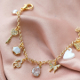 Boucles d&rsquo;oreilles et bracelets tendance avec des breloques et des connecteurs en zirconium :