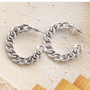 D&eacute;couvrez comment combiner vos boucles d&rsquo;oreilles DQ branch&eacute;es avec des breloques 