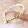 Confectionnez des bracelets hauts en couleurs avec du cordon en satin et des connecteurs en acier inox 