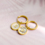 Cr&eacute;ez des bijoux personnels avec des pendentifs en acier inox et nacre