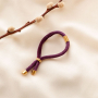 Voici comment utiliser le ruban &eacute;lastique Ibiza pour une collection de bracelets