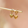 Comment pr&eacute;senter les boucles d'oreilles en acier inoxydable