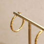 Conseils pour porter des boucles d'oreilles en acier inoxydable