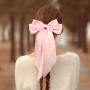 Mix & match votre collection avec des chouchous & barrettes &agrave; n&oelig;ud