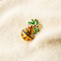 Mix & match avec des broches tendance